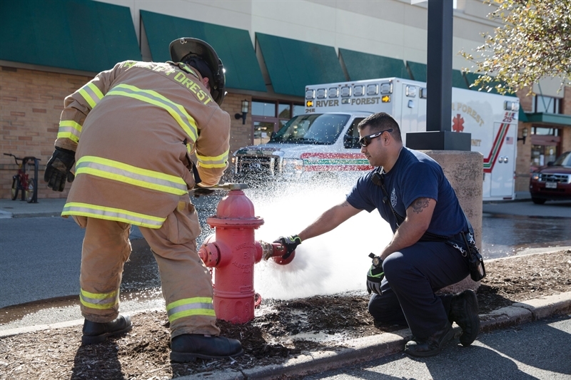 Firemen testing fire hydrant